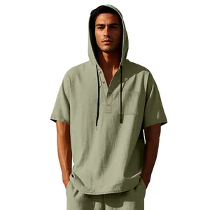 Men's loose linen hooded Henley short sleeve t-shirt in sage green olive color.