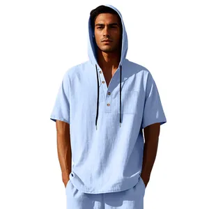 Detail view of a men's light blue hooded linen Henley short sleeve t-shirt with pocket