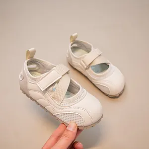 Elegant white ballet-style sneakers for girls with breathable mesh and Velcro strap