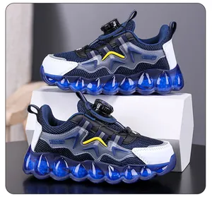 Vue latérale de baskets bleu marine pour enfants avec mesh respirant et boucle rotative