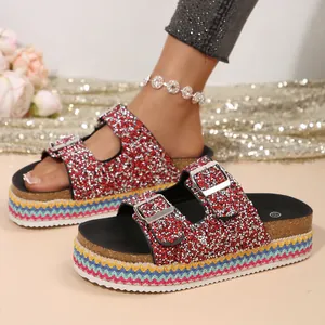 Red sparkly double buckle platform sandals with colorful ethnic woven sole detail