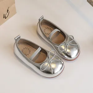 Metallic silver girls' princess shoes with soft soles and bow detail for toddlers