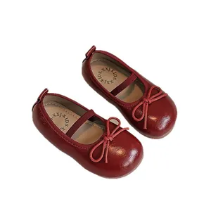 Classic wine red leather Mary Jane shoes for toddler girls with decorative bow detail