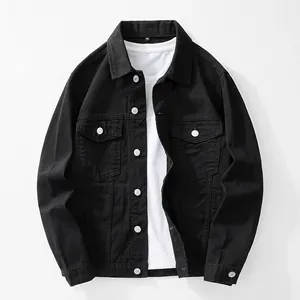 Men's classic black denim jacket in a vintage street style with shiny silver buttons