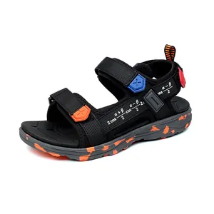 Boys' black lightweight beach sandals with orange camo sole and math formula design
