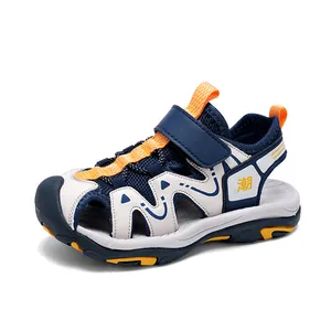 Boys' closed-toe sandals with anti-slip soft sole and sporty mesh design in navy blue.
