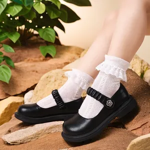 Chaussures Mary Janes en cuir noir pour filles avec semelles antidérapantes et fleur décor