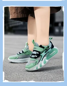 Detailed view of boys' breathable mint green mesh athletic sneakers for summer sports