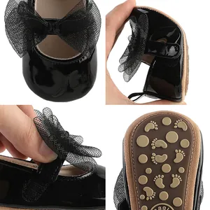 Detalles de zapatos de princesa para bebé en charol negro con lazo y suela de goma