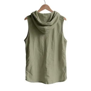 Back view of men's olive green linen sleeveless hooded shirt on wooden hanger