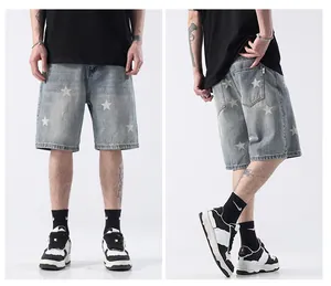 High-quality men's light blue denim shorts featuring white star print patterns and relaxed fit
