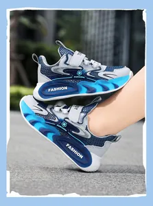 Breathable mesh boys' sports sneakers featuring blue and white design with wavy soles