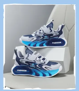 Breathable blue and white mesh boys' running shoes with secure hook-and-loop straps.