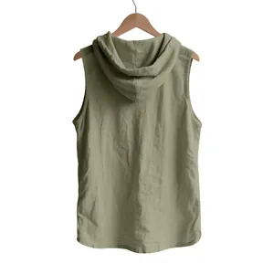 Detailed back view of men's sleeveless hooded linen shirt in khaki green texture