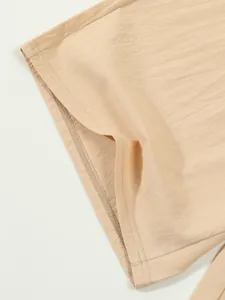 Macro detail of breathable beige cotton linen fabric and stitching for men's shorts