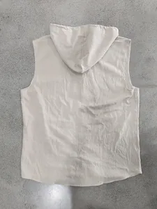 Detailed back view of men's casual sleeveless linen hooded shirt in breathable beige fabric