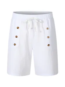 Front detail of men's white cotton linen shorts with buttons and drawstring