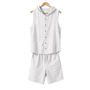 Full view of white linen two-piece set including hooded sleeveless shirt and shorts.