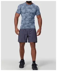 Front view of men's blue camouflage seamless compression t-shirt for fitness training