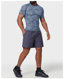 Men's quick-dry athletic t-shirt with seamless jacquard pattern shown on model
