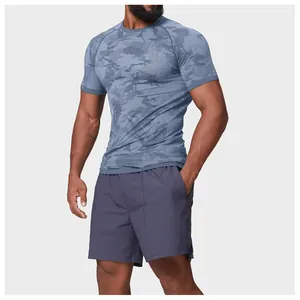 Men's seamless camouflage athletic t-shirt and grey training shorts fitness outfit