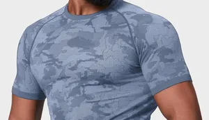 Detailed close-up showing the blue camouflage jacquard texture of seamless men's athletic shirt