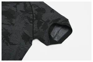 Close-up of seamless jacquard camouflage pattern on athletic short sleeve shirt
