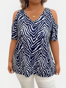 Fashionable plus size cold shoulder V-neck top featuring a bold navy and white zebra print