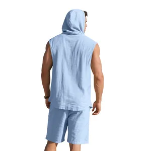 Back view of a men's light blue sleeveless hooded linen shirt and matching shorts set.