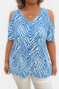 Macro view of blue zebra print plus size top with stylish cold-shoulder cutouts