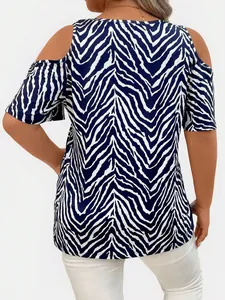Back view detail of a plus size women's zebra print cold shoulder summer top for vacations