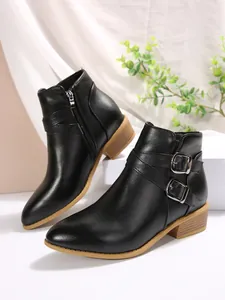 Elegant black pointed toe ankle boots with decorative side buckles and side zipper.