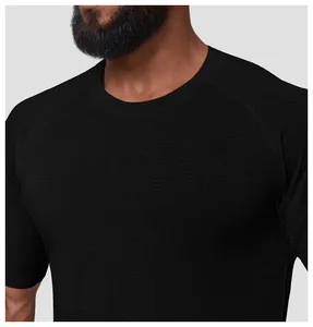 Close-up of seamless quick-dry sports T-shirt for men showing breathable wavy texture.