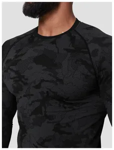 Detailed close-up of seamless camo jacquard pattern on athletic long-sleeve T-shirt