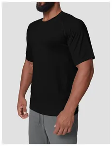 Close-up view of a black seamless quick-dry sports t-shirt with wave texture for men