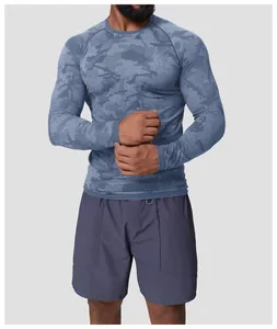 Detailed view of men's seamless camo jacquard long sleeve sports t-shirt on model.