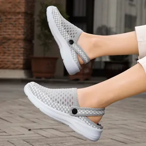 Lightweight breathable grey mesh clogs for men and women, slip-on comfort design.
