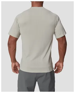 Back view of a men's seamless quick-dry athletic t-shirt in light sage green