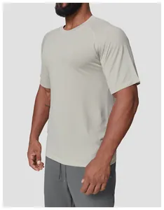 Detailed side view of a men's seamless quick-dry sports t-shirt in breathable light grey