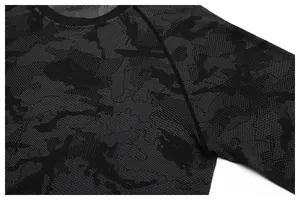 Close-up detail of seamless camo jacquard fabric on athletic long sleeve shirt