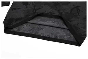 Close-up detail of seamless jacquard wicking long sleeve sports training top fabric
