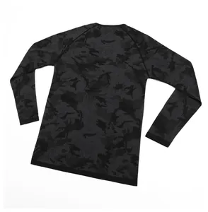 Detail view of the seamless jacquard camouflage pattern on athletic long sleeve