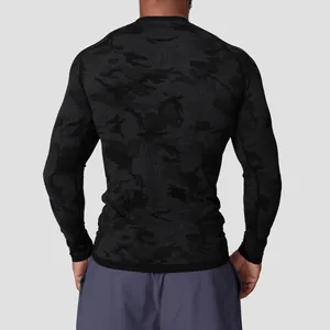 Back view of men's seamless jacquard camo long sleeve sports T-shirt for gym fitness