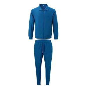 Vue détaillée de l'ensemble de survêtement en maille gaufrée bleue avec veste et pantalon