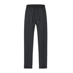 Front view of men's slim-fit casual trousers with drawstring waist and pleat detail
