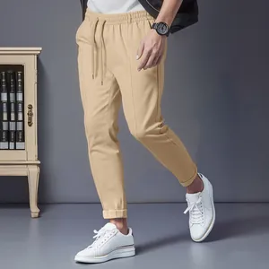 Men's khaki slim fit tapered casual pants with drawstring waist for spring