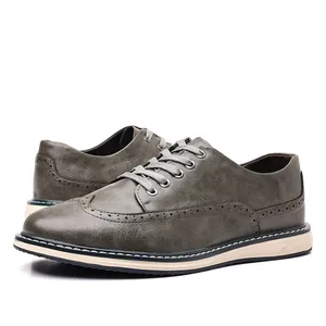Atmungsaktive graue Brogue-Lederschuhe für Herren mit breiter Passform und Sohle