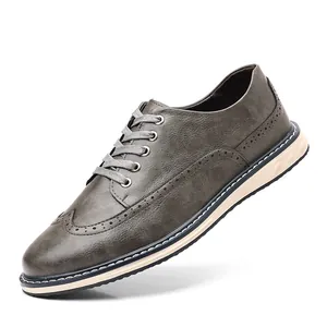Scarpe stringate brogue vintage grigio scuro da uomo in pelle con motivi classici