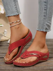Stylish red platform wedge flip-flop sandals for women with metal chain details