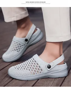 Macro view of women's breathable light grey fly-knit sandals with mesh texture detail